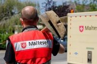 Ehrenamtlicher Malteser im Hochwasser-Einsatz 2021 - Verteilung von Lebensmittel und Ausrüstung im Kreis Euskirchen. Foto: Malteser
